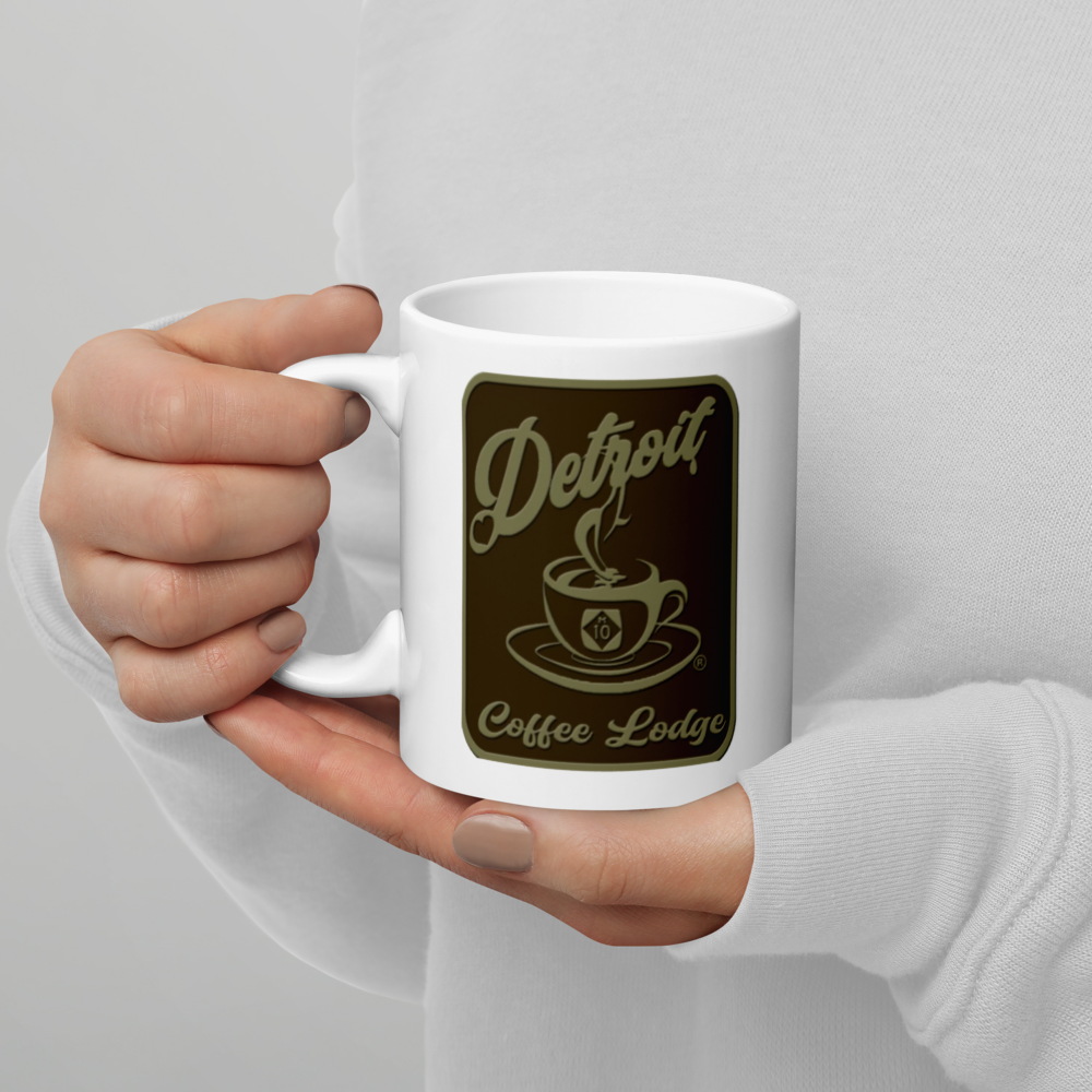 White glossy mug with brown logo